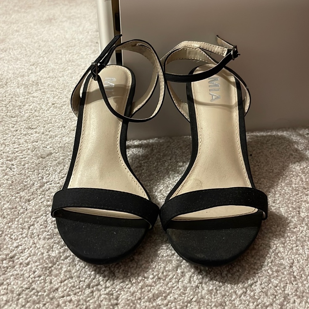 MIA size 6.5 black high heel. Worn a few times, good condition